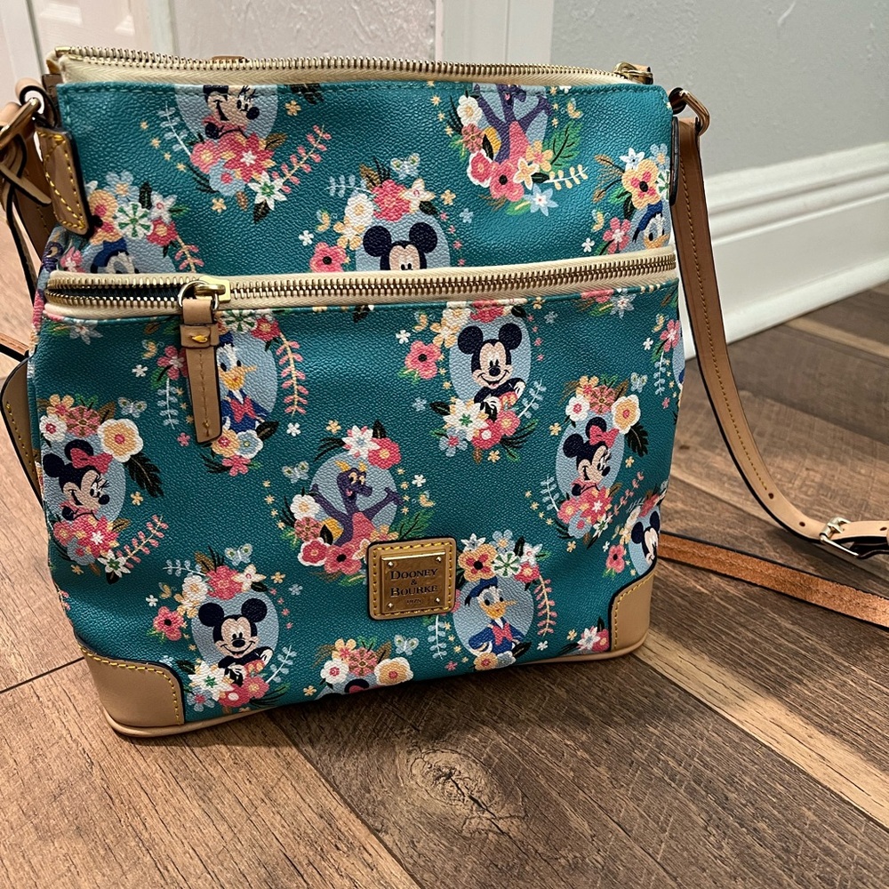 Great used condition flower and garden Disney d&b letter carrier